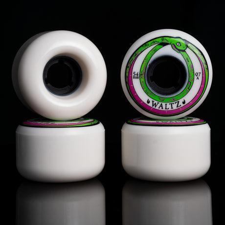waltz primo deep radial 4 stack snake wheels 97a 54mm white skateboard wheels with black core, freestyle offset wheels from waltz skateboards with snake oroboros graphic pink and green print in black reflective backgraound, oldschool skateboard longboard coconut wheels
